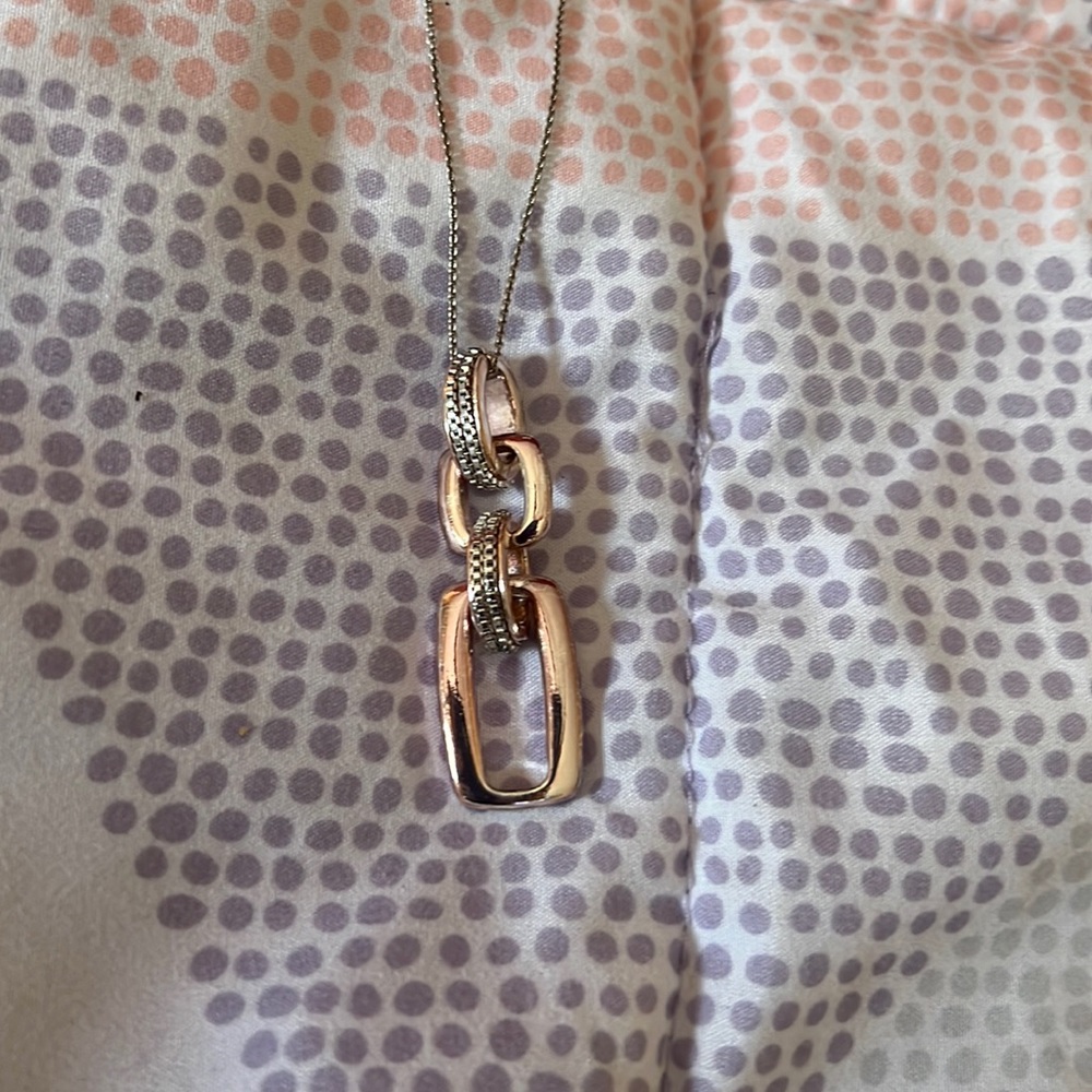 Rose gold tone 4 loop charm